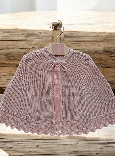 Powder pink fine knit cape.