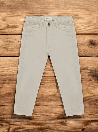 Sand-colored canvas pants.