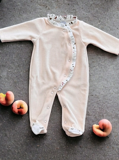 Soft peach colored pajamas.